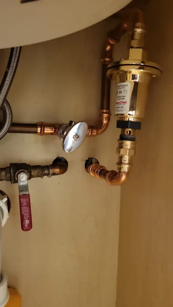 New quarter-turn shut-off valve and copper supply line installed after a leak in Clifton, NJ